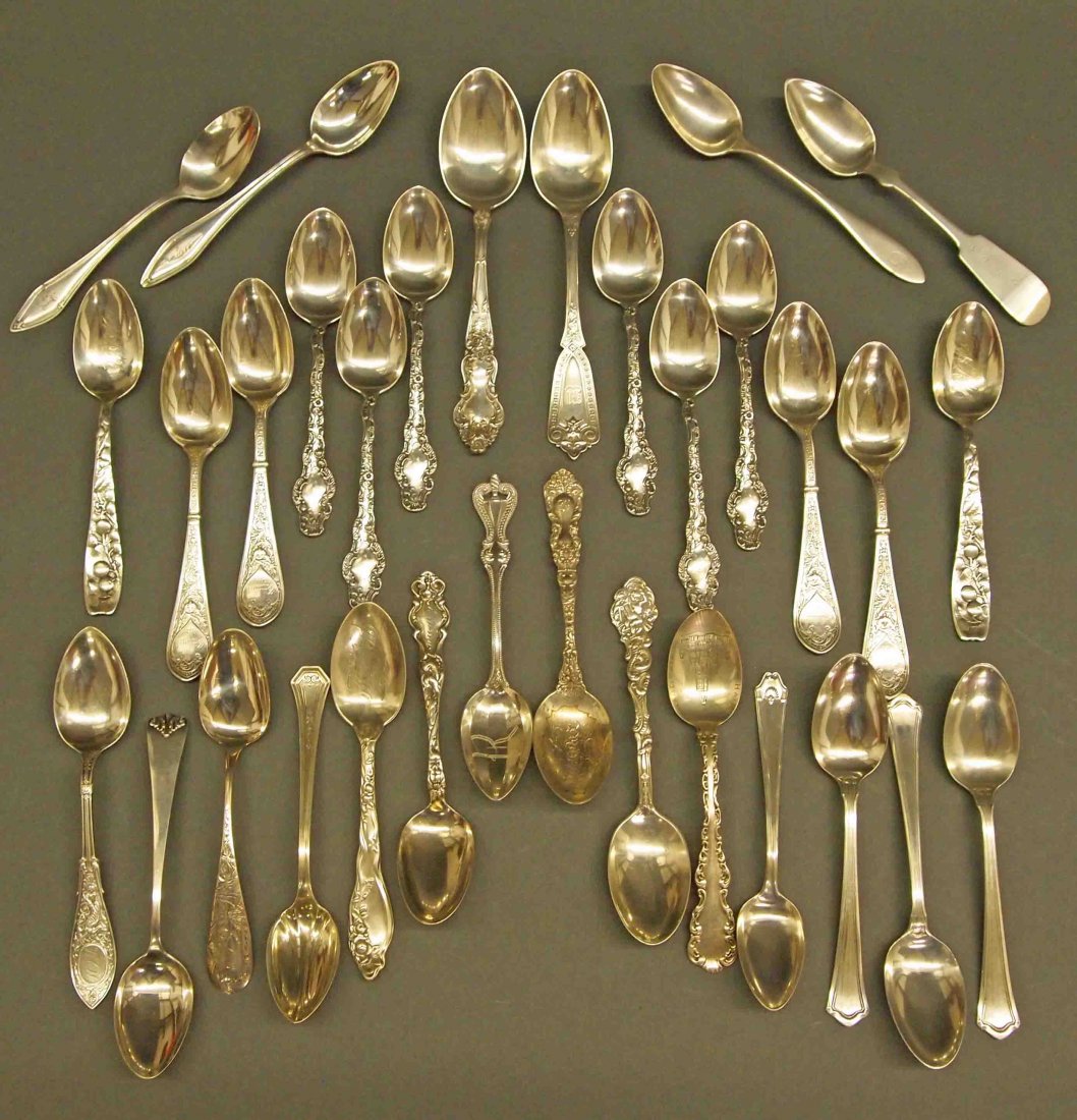 32 American Sterling Spoons: Thirty-Two American 19th and 20th Century Sterling Spoons. By a variety of makers, in numerous patterns, including Towle "Colonial", Gorham "Versailles" and "Raphael", and Whiting "Berry" and "Arabesq
