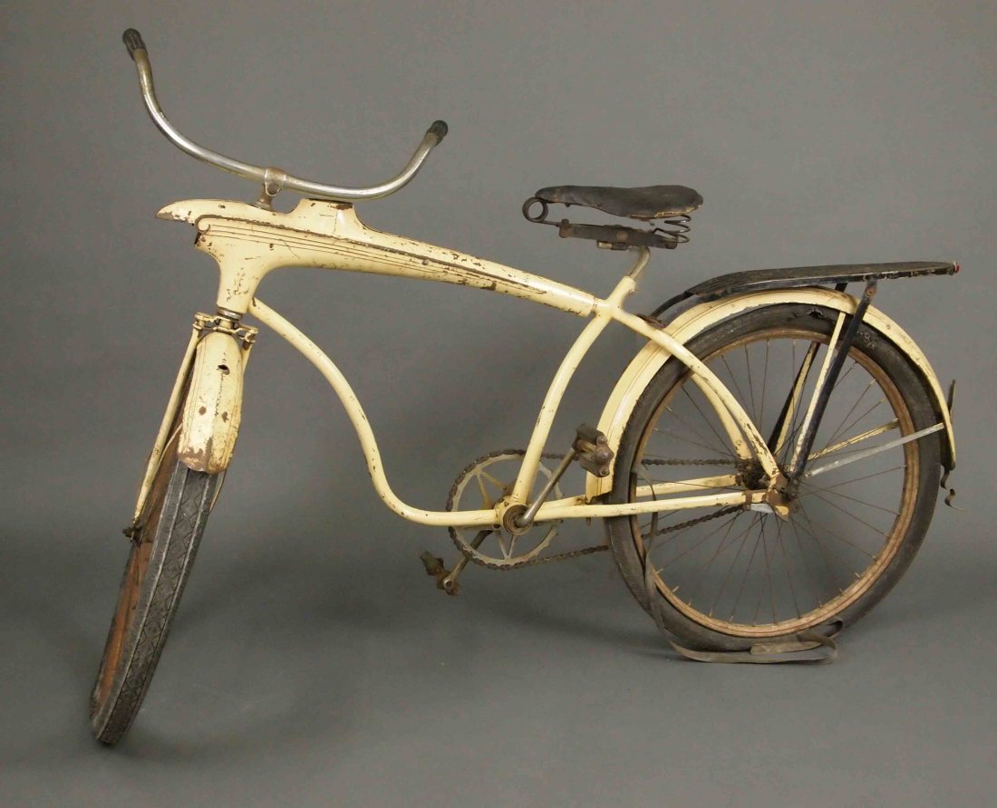 Elgin Bluebird Bicycle: A 1938 "Elgin Bluebird" bicycle. Original paint, double spring seat. Heavy pitting to the chrome, lacks headlight and its components, some loss to the seat and overall wear, paint loss and rust. 22" w