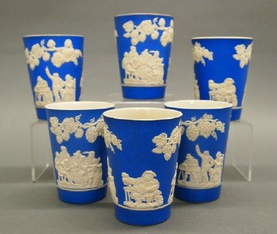 6 Copeland Spode tumblers: Six turn of the century Copeland Spode stoneware tumblers. Applied Tavern scenes and "Vintage" detail on a medium Blue ground. Printed and impressed marks. Some minor wear. Each 4" high. ESTIMATE $100