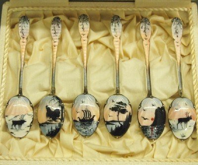 D. Anderson demi tasse spoons: Six David Anderson (Stockholm) Sterling Silver demi tasse spoons with enameled decoration. Various scenic designs with birds and animals on Guilloche backgrounds. Slight wear, cased. ESTIMATE $200-300