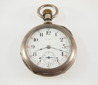 Elgin "B. W. Raymond": Elgin "B. W. Raymond" 18 size, 19 j, Adjusted, SW, LS, Fahys "Monarch" Coin Silver, OF, SSD w/Arabic numerals. Serial #8579804. Some case wear, hairlines in dial. Winds, sets and running when cataloge