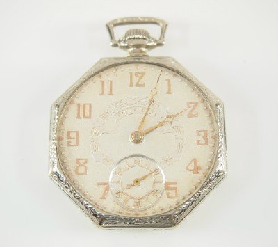 Southbend "Studebaker": South Bend "Studebaker" Octagonal 12 size, 21 j, Adj 8 pos, DR, SW, PS, Star 14k White GF, OF, Fancy silvered dial w/Arabic numerals. Serial #1120050. Minor wear. Winds, sets and running when cataloge