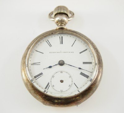 Elgin "Key in Crown": Elgin pocket watch with "Key in Crown" feature, 18 size, 7 j, KW, KS, "Junior" Coin Silver, OF, Flat porcelain dial w/Roman numerals and fancy Gold hands. Serial #2085922. Slight case wear, hairlines 