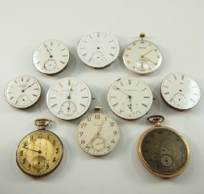 10 Elgin pocket watch movements (1 of 2)