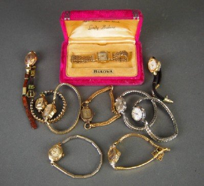 10 Bulova women's wristwatches: Ten Vintage Bulova women's wristwatches with various bands. AS-IS. ESTIMATE $100-200