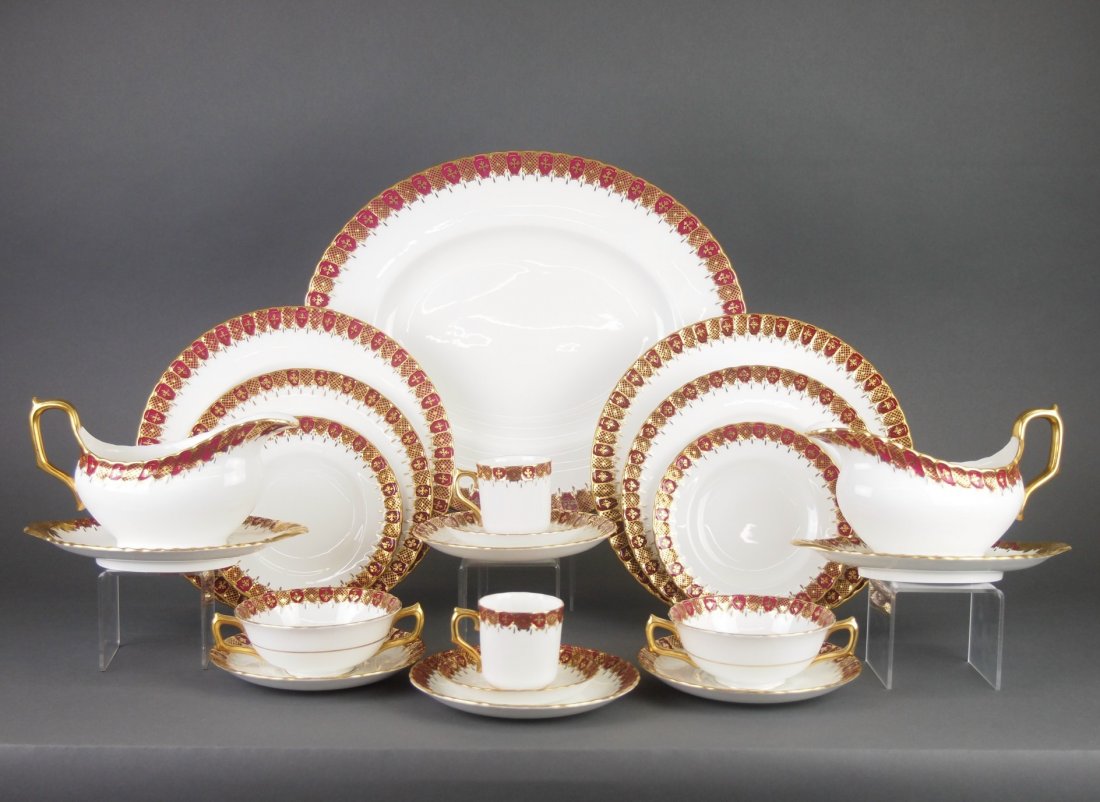 Royal Crown Derby Dinner Service: A Royal Crown Derby "Heraldic-Maroon" Pattern Porcelain Dinner Service. Ninety-Seven pieces include 12 dinner plates, 12 salad plates, 12 bread and butter plates, 12 demitasse cups and 8 saucers, 12 c