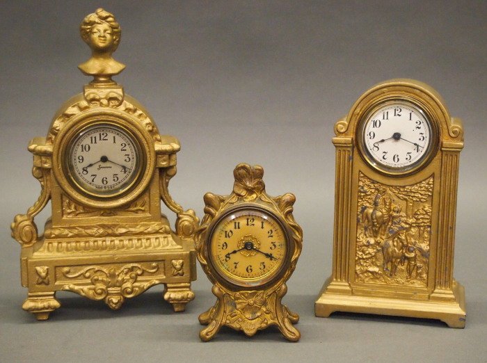 3 Iron Novelty clocks (1 of 1)