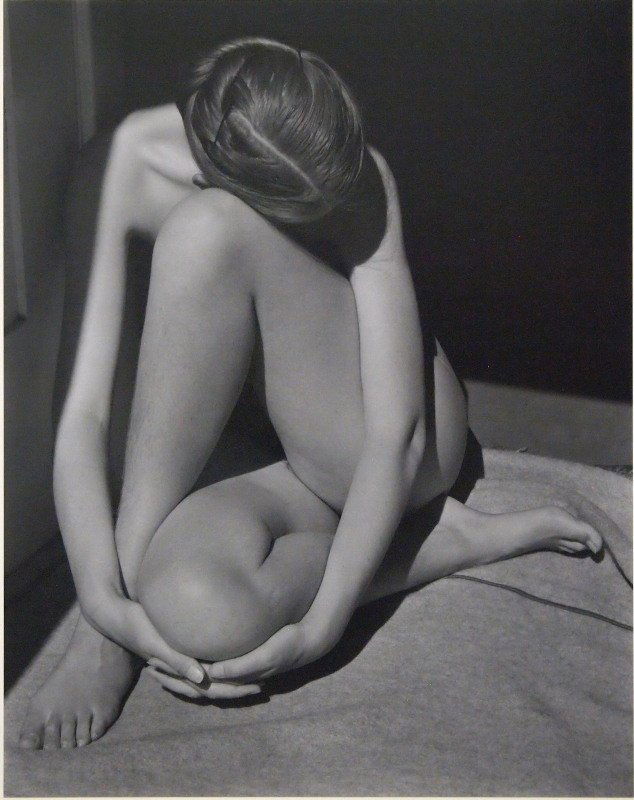 Edward Weston photograph "Charis": Edward Weston, American, 1886-1958. Gelatin silverprint, mounted on board, printed later by Cole Weston. Entitled "Nude, 1936 (Charis, Santa Monica)", depicting a woman seated with her head down, legs