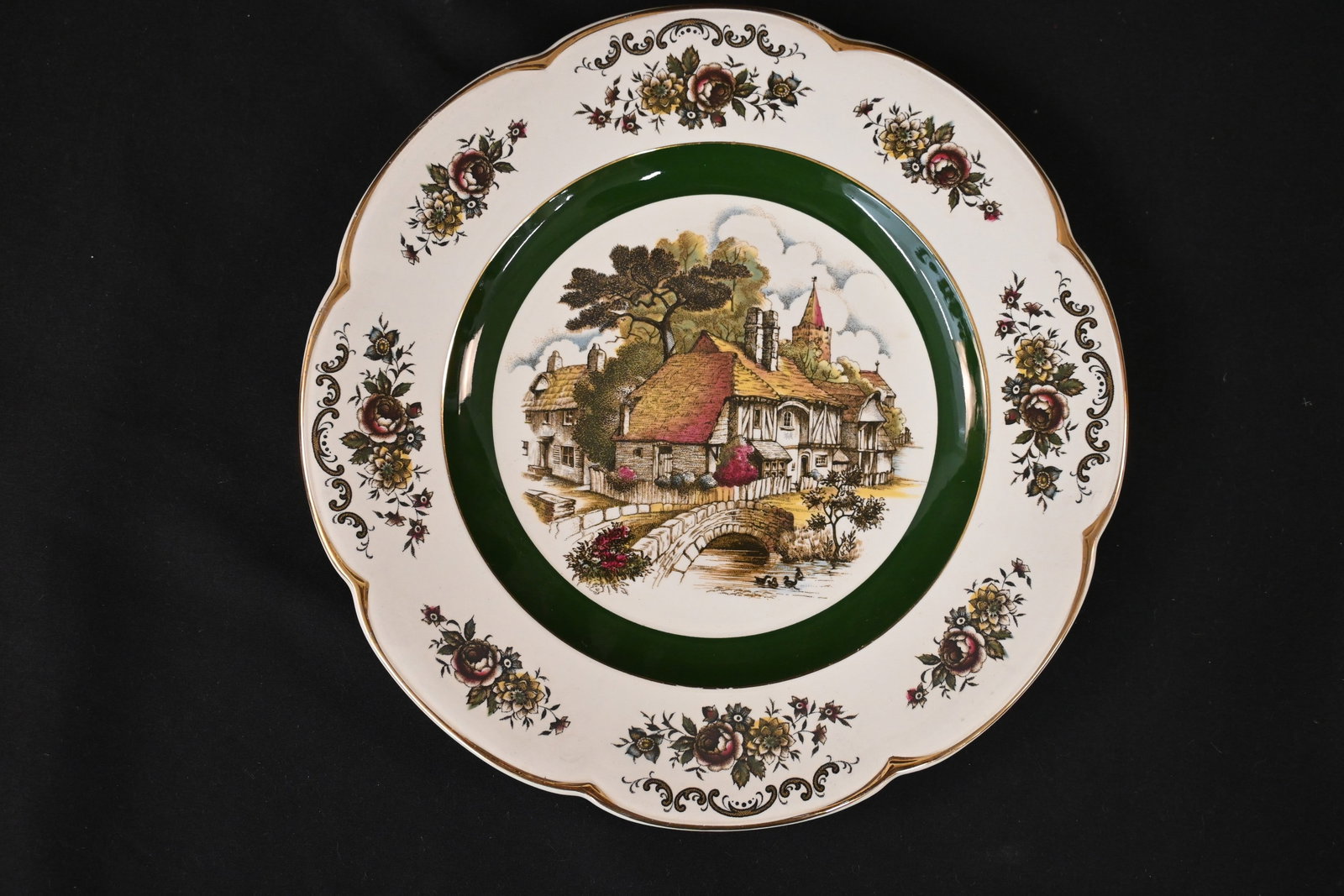 Vintage Wood & Sons England "Ascot Service Plate" Decorative Plate: English Tudor House Scene: This classic, vintage decorative plate is a product of the English pottery firm Wood & Sons, part of their popular "Ascot Service Plate" line. The plate features a charming, hand-detailed transferware