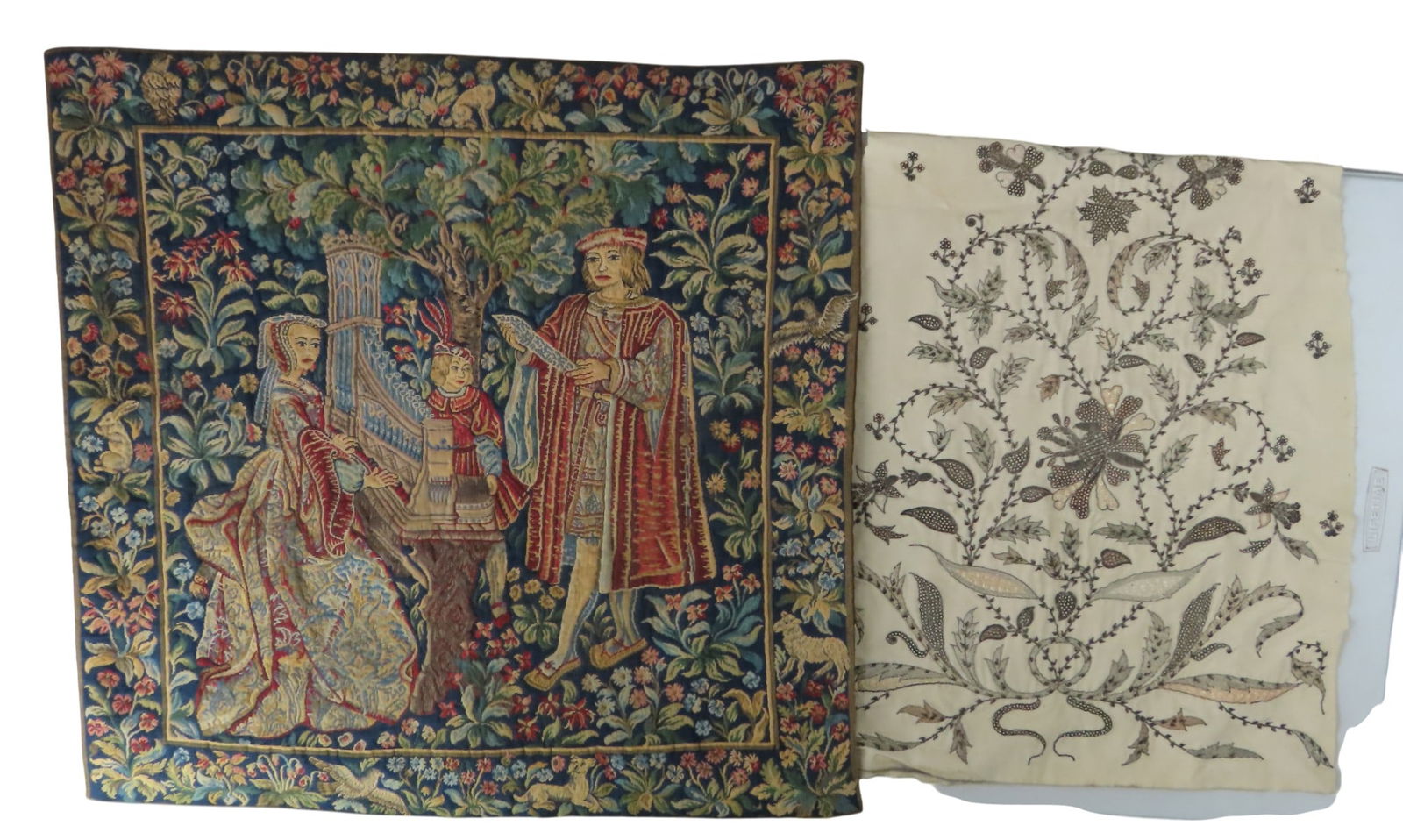 A METAL EMBROIDERED SILK PANEL 100 cm long together with a 20th Century tapestry panel, depicting a: A METAL EMBROIDERED SILK PANEL 100 cm long together with a 20th Century tapestry panel, depicting a medieval scene of a lady playing a pipe organ 68 x 68 cm Provenance: Contents of The Manor House, Te