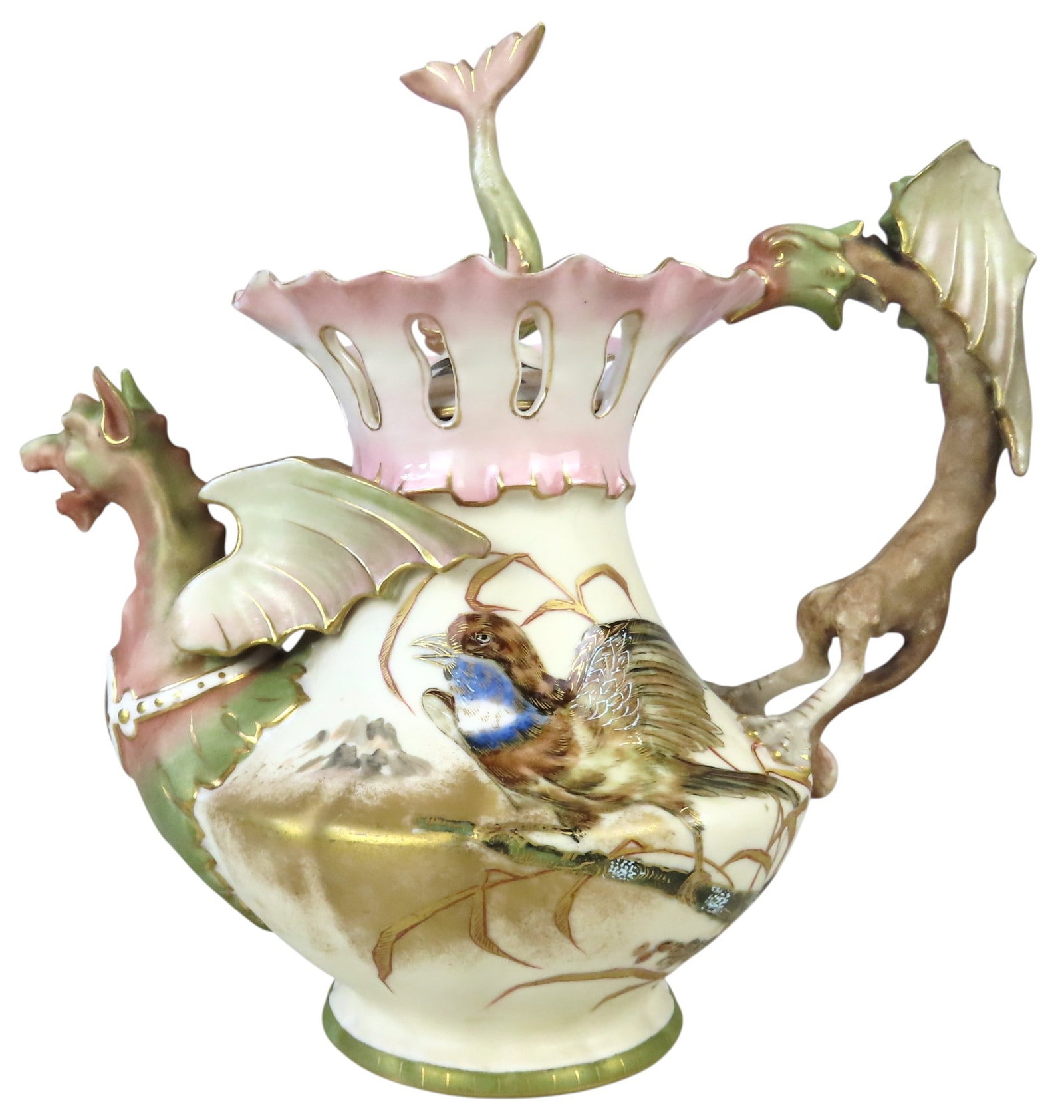 AN ALFRED STELLMACHER TEPLITZ TEAPOT CIRCA 1890 ivory blush ground painted with birds, with: AN ALFRED STELLMACHER TEPLITZ TEAPOT CIRCA 1890 ivory blush ground painted with birds, with distinctive dragon spout and handle, the domed cover surmounted by a dolphin 22 cm high
