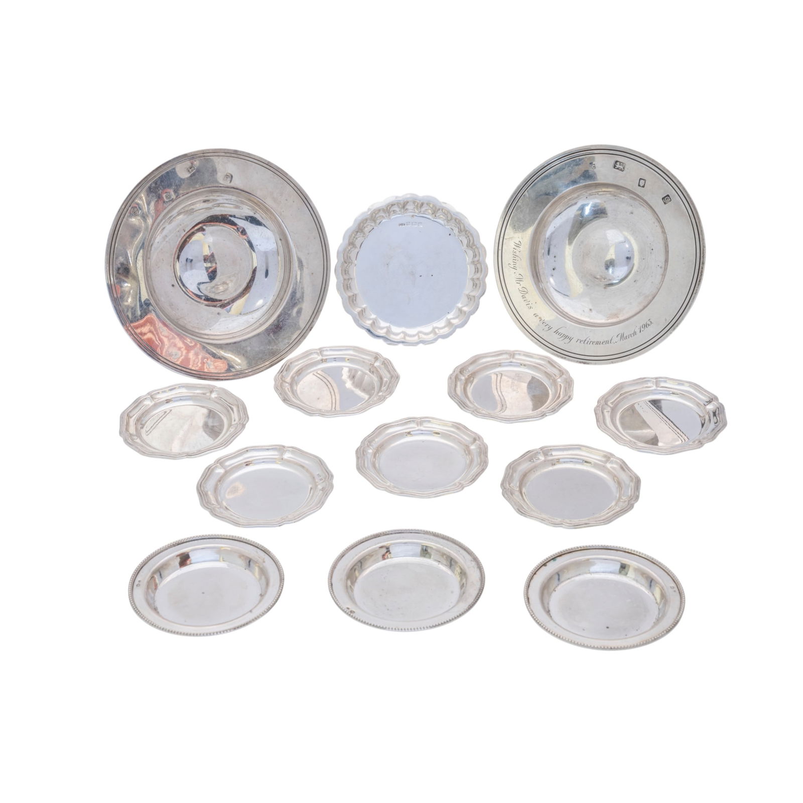 A CIRCULAR SILVER ASHTRAY London, 1962, another similar and various other silver ashtray/coasters,: A CIRCULAR SILVER ASHTRAY London, 1962, another similar and various other silver ashtray/coasters, 418g