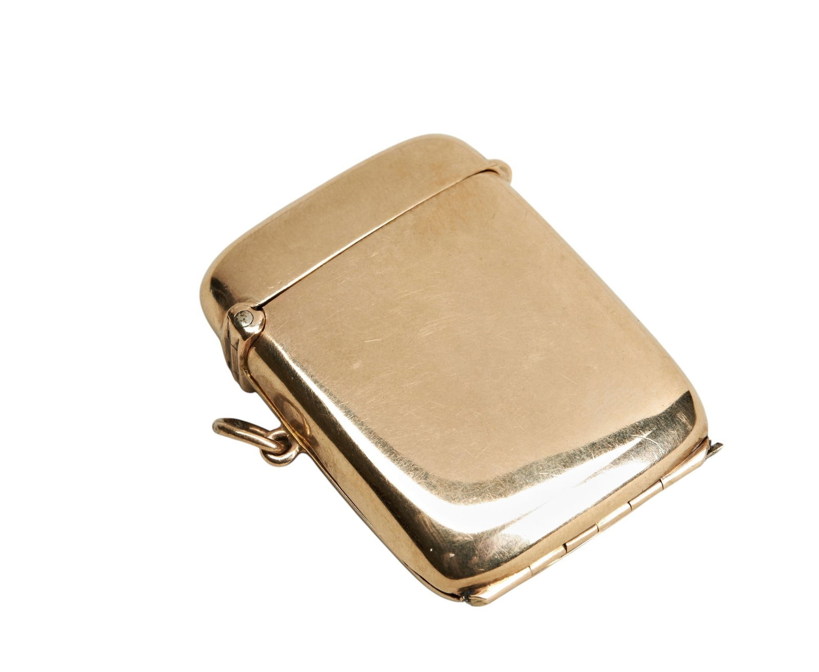 A 9CT GOLD VESTA CASE WITH INNER PHOTO FRAME, CHESTER 1913 The lid of the vesta lifts to reveal a: A 9CT GOLD VESTA CASE WITH INNER PHOTO FRAME, CHESTER 1913 The lid of the vesta lifts to reveal a hinged side panel containing an oval photo frame 4.5 cm 28 g