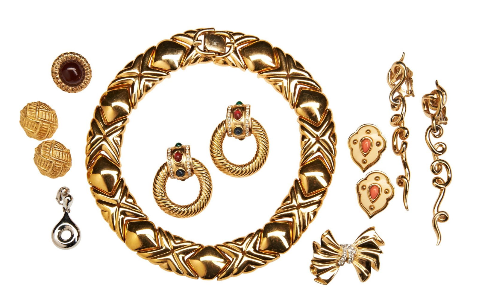 A GROUP OF COSTUME JEWELLERY, to include: GIVENCHY, A PAIR OF PASTE SET EAR CLIPS, the: A GROUP OF COSTUME JEWELLERY, to include: GIVENCHY, A PAIR OF PASTE SET EAR CLIPS, the reeded hoops suspended below a panel set with green, red and blue cabochon paste, between circular cut whit